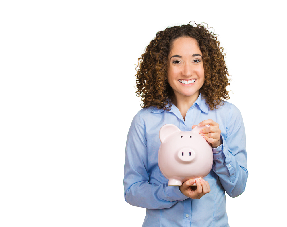 Closeup portrait happy beautiful business woman bank employee, student hugging piggy bank, excited open savings account isolated white background. Financial concept. Positive emotion facial expression